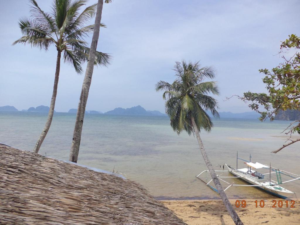 Islandfront Cottages And Restaurant El Nido Esterno foto